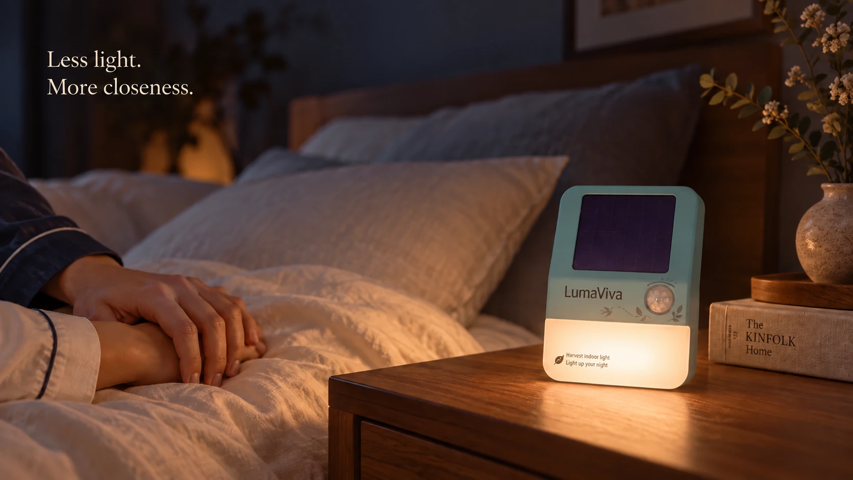 LumaViva glowing beside a couple holding hands at bedtime